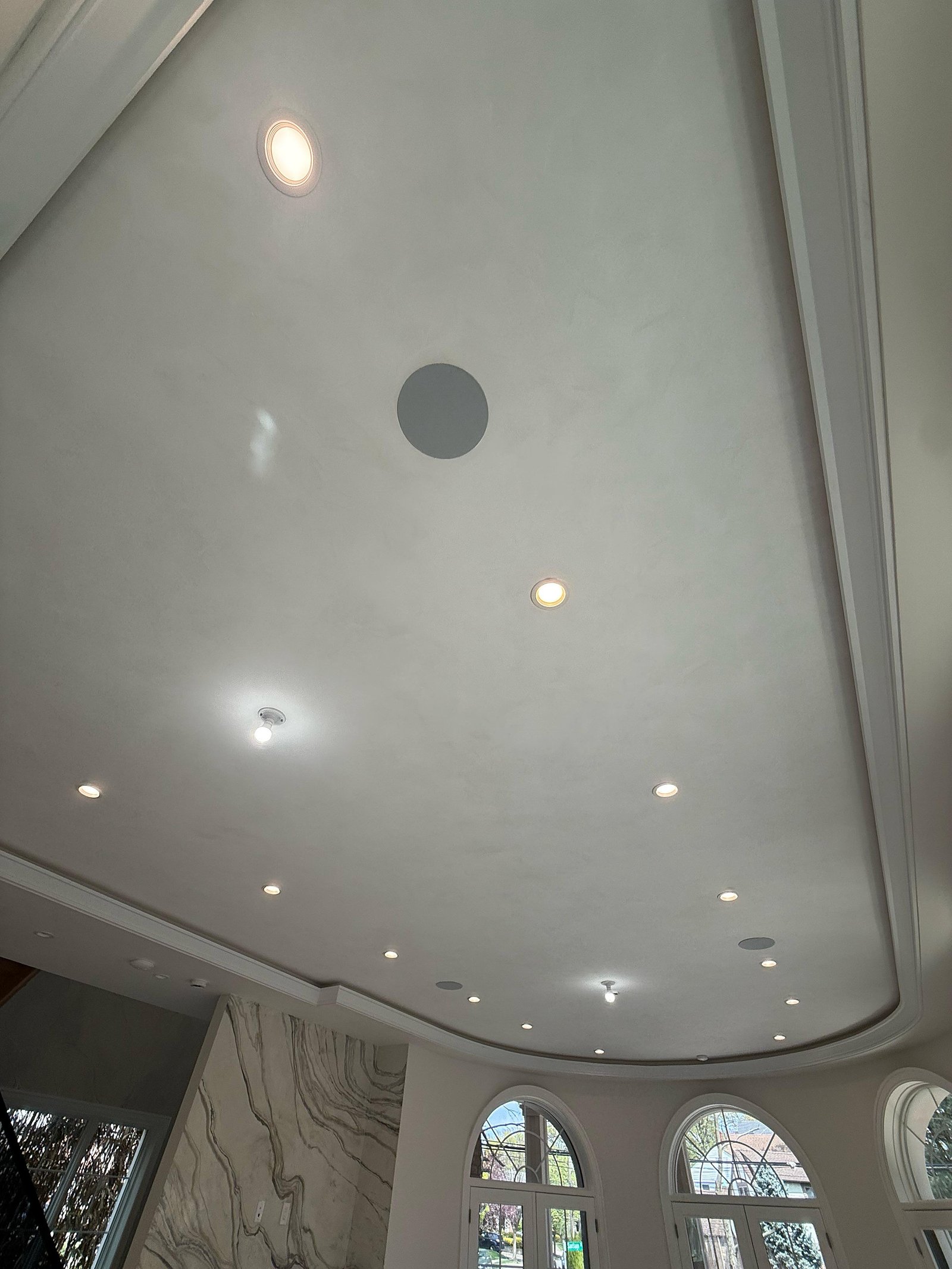Smooth polished-plaster ceiling and walls with arched windows in a Great Neck estate — MarkOn® Walls