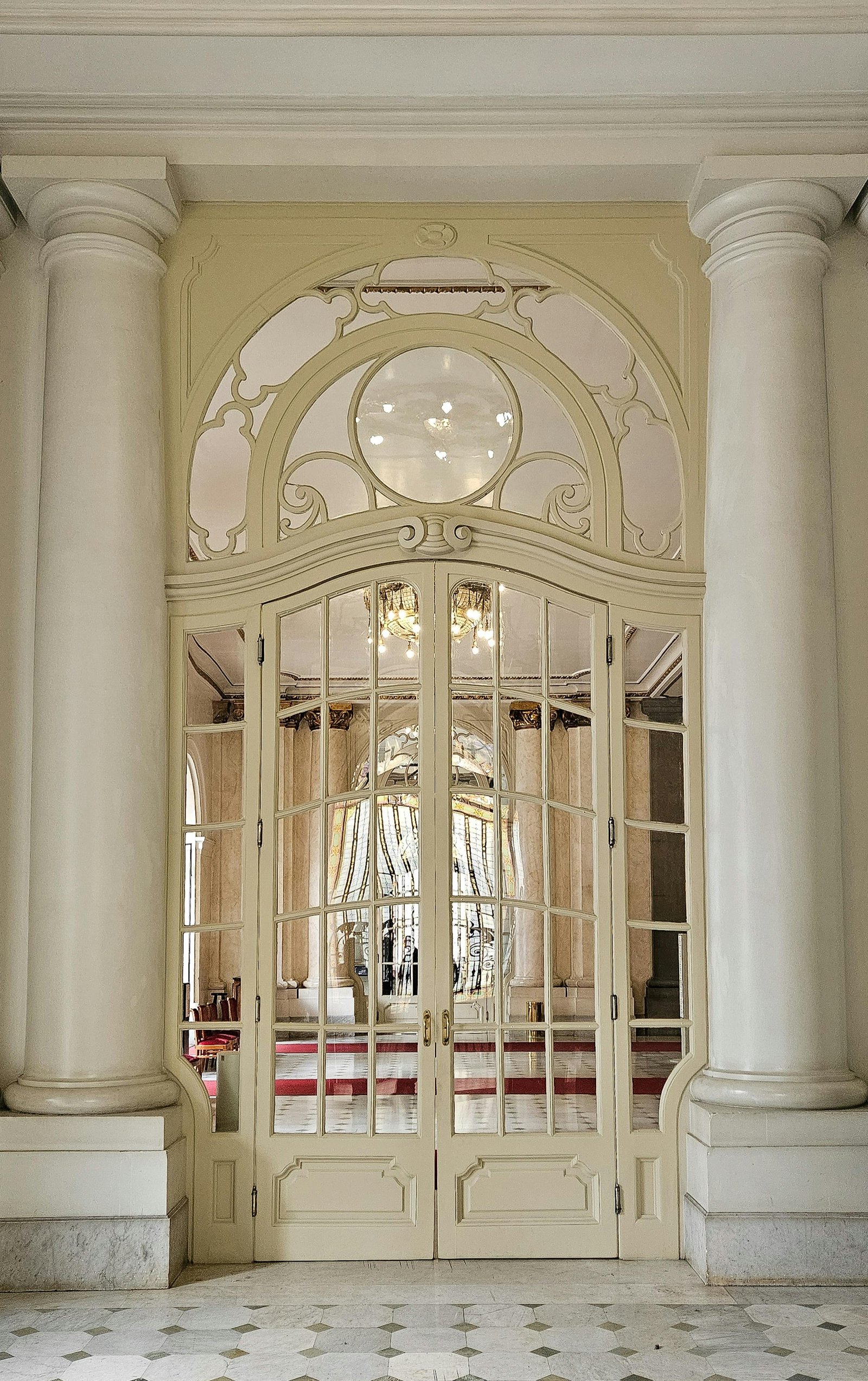 Heritage Beaux-Arts plaster doorway with hand-gilded cornice and acanthus capitals — MarkOn® Walls studio, by invitation